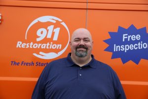 911-restoration-water-damage-mold-remediation-man-van